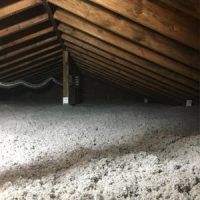 Attic insulation in Brossard, adding cellulose